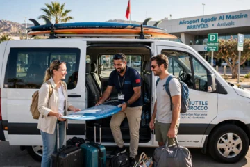 Shuttle bus Taghazout to Imsouane on coastal road with surfboards